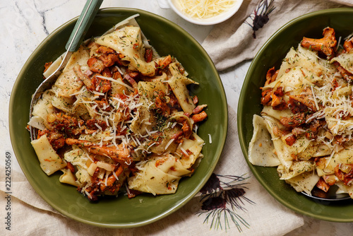 Homemade pasta with sauteed chanterelles, bacon, and Parmesan