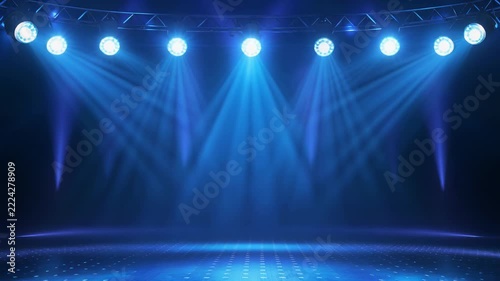 Blue stage spotlights moving with concert atmosphere during a dramatic performance