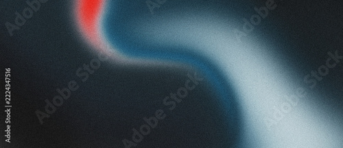 Abstract grainy texture with a flowing curved gradient of red and blue light on a dark background