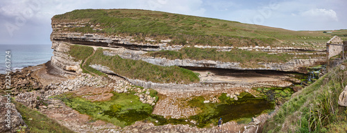 Panoramic view Cantabrian beautiful waterfall. El Bolao cliffs. Cantabria, Spain
