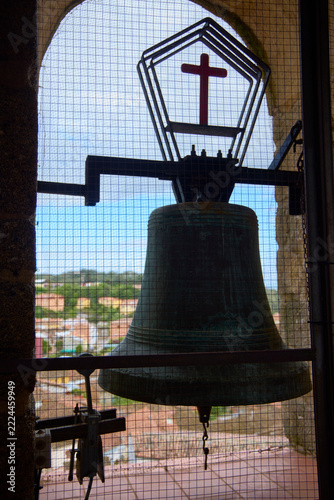 Bell in a bell tower. This bell is located in the tower of the Church of Santa María in Jarandilla de la Vera, in the province of Cáceres.