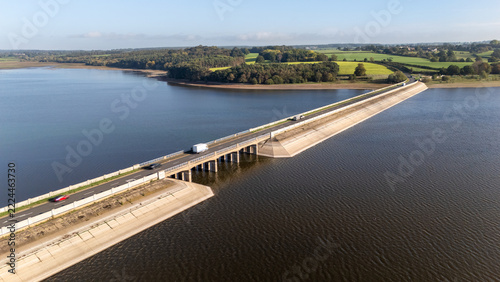 Road and traffic over Blithfield Reservoir, Staffordshire, England