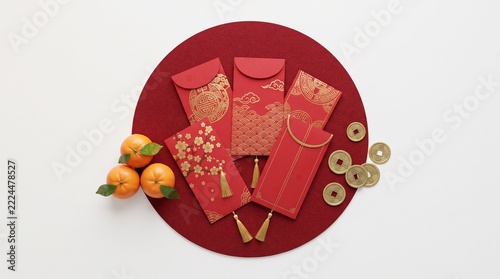 Chinese New Year Red Envelopes with Oranges and Coins on Red Circle Background