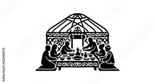 People gathered in a yurt for a meal.