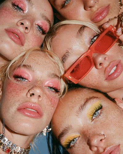 Experimental fashion photography featuring bold styling and dramatic perspectives captured with an ultra-wide-angle lens from extreme low and high camera angles.