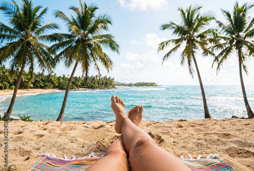 Attractive lady relaxing on the beach