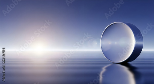 Clear glass lens against blue sky background