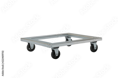 Metal dolly transporting goods with industrial wheels and transparent background