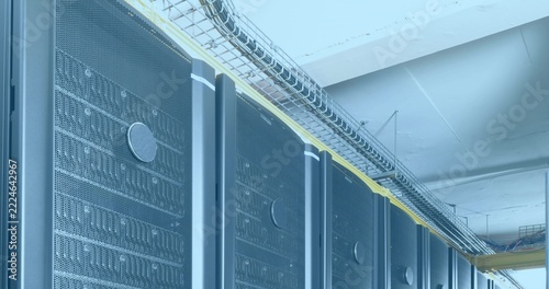 Displaying rack cabinets running along data center aisle, with perforated doors and cable trays