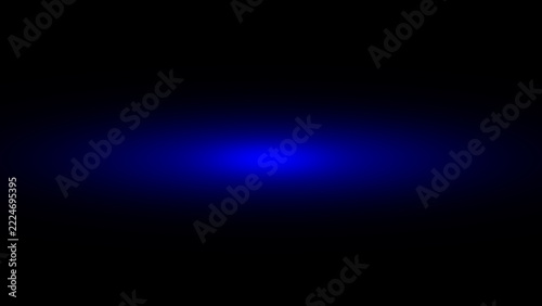 abstract blue neon light streak and glowing spotlight beam on black background for design overlays