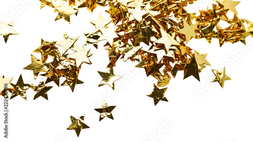 Isolated pile of shiny golden star confetti scattered for festive celebration or holiday design