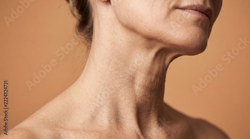 Authentic close-up of a mature woman neck showing natural wrinkles and aging skin