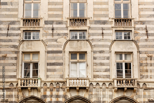 Exterior view of details of the architecture of historic buildings within the Plaza San Matteo, Genova