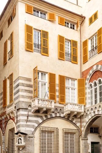 Exterior view of details of the architecture of historic buildings within the Plaza San Matteo, Genova