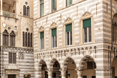Exterior view of details of the architecture of historic buildings within the Plaza San Matteo, Genova