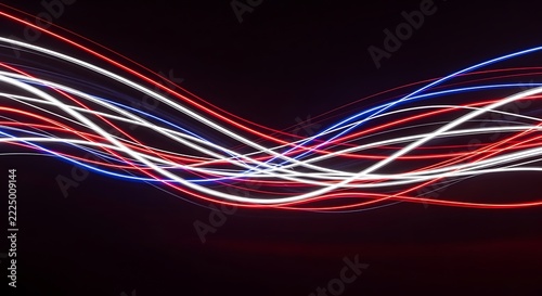 Abstract light trails of red white and blue neon lines