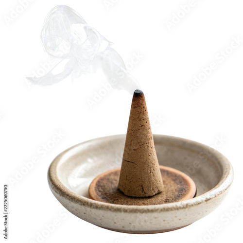 Incense cone burning on ceramic holder isolated on white background