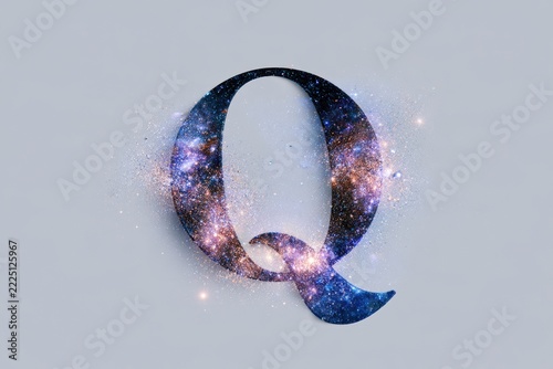 Letter Q with galaxy stardust sparkles on grey background