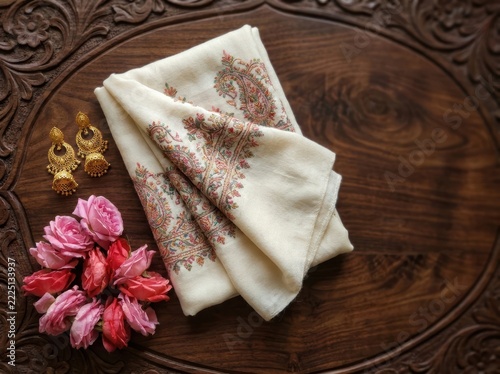 Kashmiri pashmina shawl and gold jhumka earrings with roses
