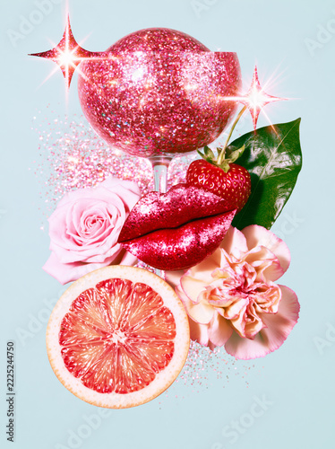 Glittery Cocktail with Flowers and Fruits on Blue Background