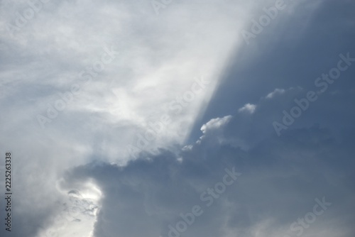 sunlight spreading through cloud on twilight sunset sky in evening  