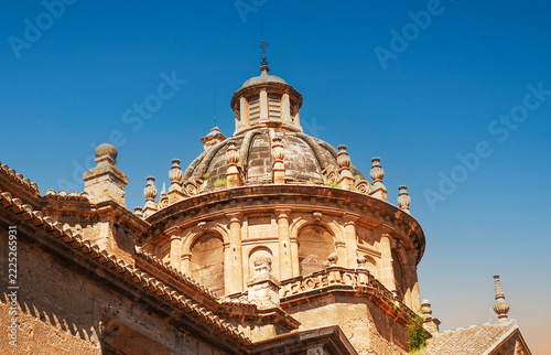 An ancient golden dome that kisses the clear sky in the eternal enchantment of Granada