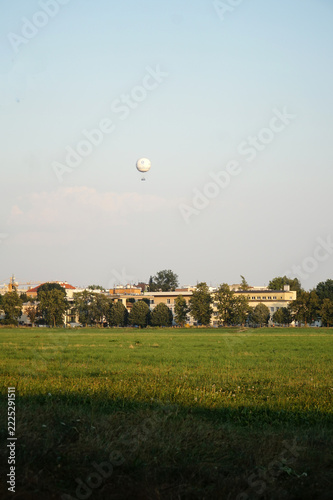 A tethered observation aerostat (a balloon on a cable) near TAURON Arena Krakow and Park Lotnikow Polskich in Krakow   