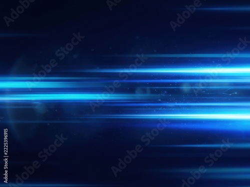 Abstract blue light streaks moving fast across a dark background with bokeh