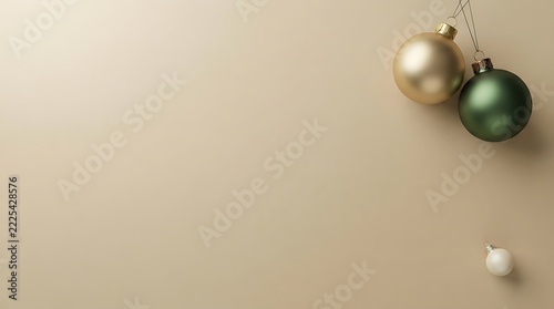 Minimalist Christmas background with hanging gold and green baubles, elegant festive holiday banner with copy space, modern beige backdrop