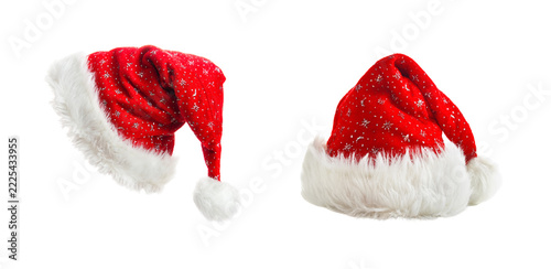 Red Santa Claus hats with silver snowflakes isolated on transparent background, Christmas plush caps set.