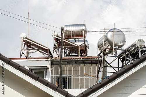 Obraz na plátně Solar water heaters on urban rooftops in Da Lat Vietnam