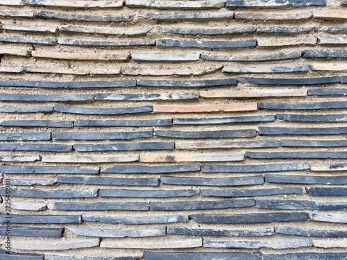 Layered Weathered Wall Surface with Irregular Horizontal Patterns