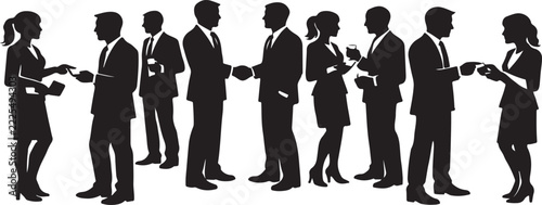 Business people shaking hands and exchanging cards in a professional setting.
