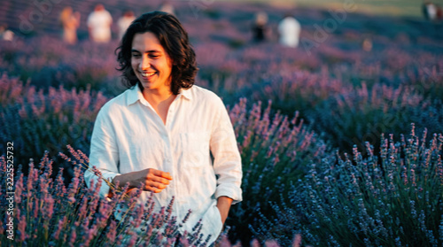 Man Walking Through Lavender Field During Golden Hour Sun