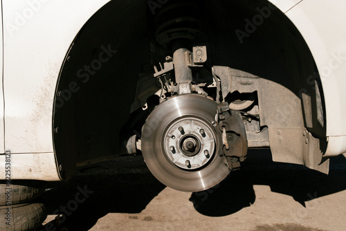 Seasonal Tire Change on a White Car