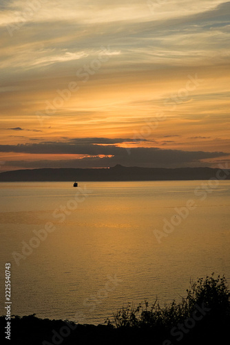 Golden sunset over a Scottish sea loch