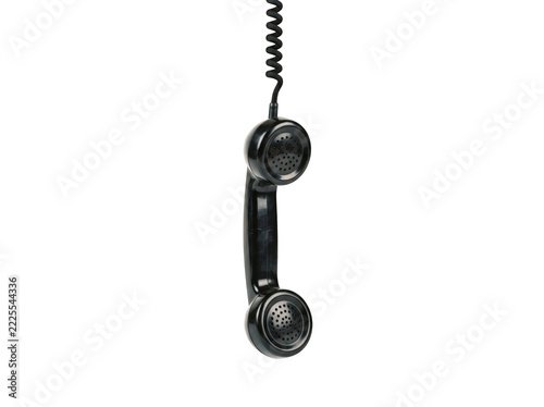 Vintage Telephone Handset Isolated on a Black Background Featuring a Classic Retro Design with a Coiled Cord Attached to the Top Receiver Unit for Communication Concepts and Nostalgic Office Imagery