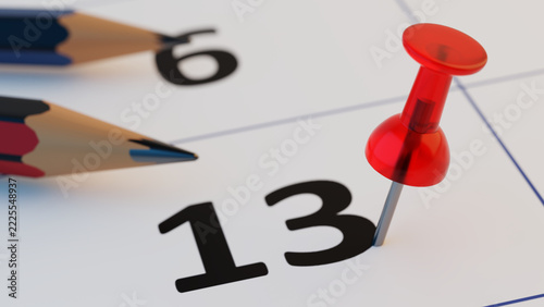 Red push pin marking day 13 on a paper calendar beside colored pencils. Close-up 3D illustration of the thirteenth day of the month, planning, reminders and deadlines.