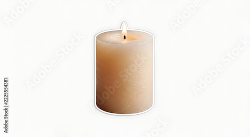A single rustic creamcolored pillar candle with a bright flickering flame isolated on a white background