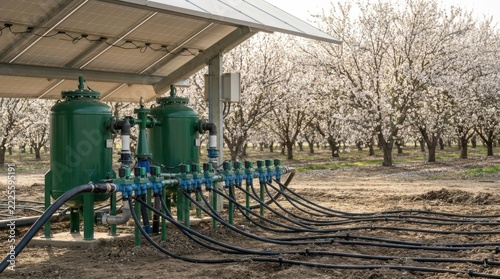 Solar Powered Irrigation System in Blooming Fruit Orchard