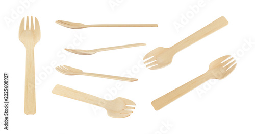 Set of disposable eco friendly wooden spork isolated from background. Single wooden fork utensil as biodegradable plastic alternative close up. Empty wood spork tool for takeaway food catering isolate