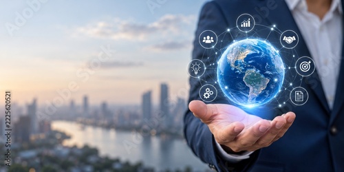 Open palm presenting a luminous blue globe with connected business icons and ...