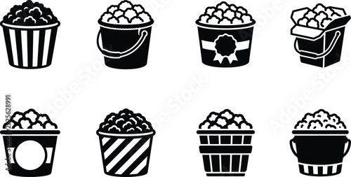 Collection of black and white popcorn buckets in various striped patterns