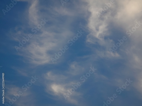 Vibrant Blue Sky with Delicate Clouds