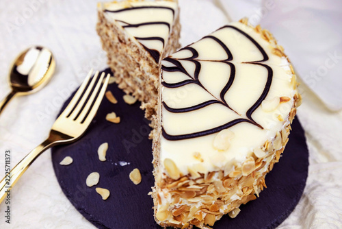 Traditional Hungarian Esterhazy cake with web decoration on the plate