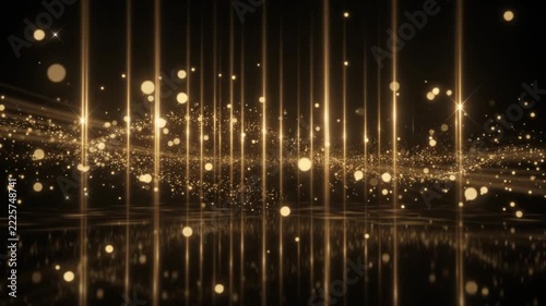 Glowing gold particles abstract background with shimmering light