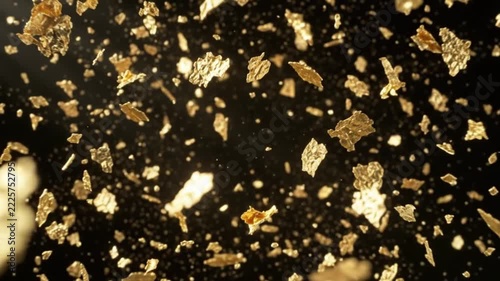 Gold particles abstract explosion on black background