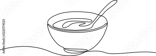 Continuous line drawing of a soup bowl with spoon, minimalist food art vector, simple black and white breakfast porridge or cereal bowl illustration