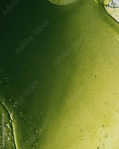 Olive green glossy liquid abstract texture
