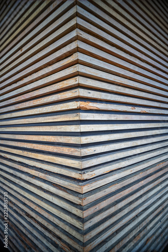 Abstract Right Angle Corner Wall with White Pine Wooden Strakes.